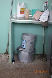 Bucket system used to filter water Punto Cortes school